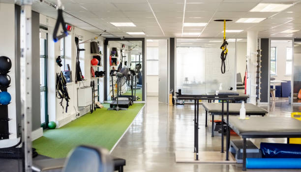 Rehabilitation center gym with therapeutic exercise equipment